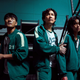 Park Hae-soo, Lee Jung-Jae, and HoYeon Jung in Squid Game.